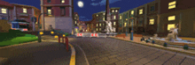 a blurry picture of a city at night with a statue in the foreground