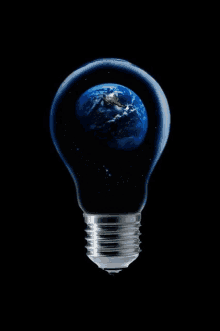 a light bulb with the planet earth inside of it