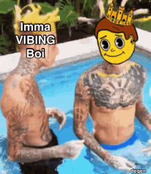 two men are sitting in a pool with the caption imma vibing boi on the bottom