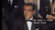 a man in a tuxedo is smoking a cigarette and says `` my name is bond , james bond '' .