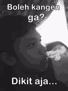 a black and white photo of a man smoking a cigarette with the caption " boleh kangen ga ? dikit aja "