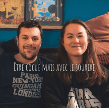 a man and a woman are sitting next to each other with the words " etre coque mais avec le sourire "