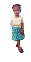 a little girl wearing a polka dot skirt and a white top