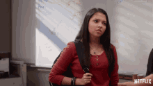 a girl with a backpack is standing in front of a white board that says " of the great depression "