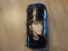 a coca cola can has a picture of a girl on it