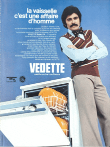 a man is standing in front of a dishwasher that says vedette