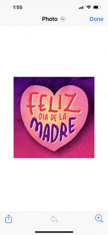 a pink heart with feliz dia de la madre on it