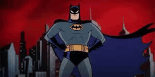 a cartoon batman is standing in front of a city skyline with his hands on his hips .