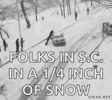 a black and white photo of a snowy street with the caption " folks in s.c. in 1/4 inch of snow "