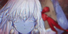 a close up of a white haired anime girl with a red bow on her neck .