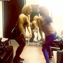 two women are dancing in front of a mirror with the hashtag #thenextbigthing