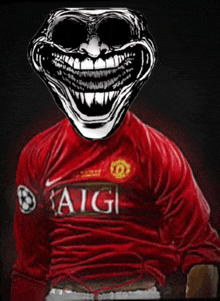 a man in a red aigi jersey with a troll face on his head