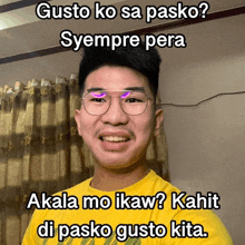 a man wearing glasses and a yellow shirt with the words gusto ko sa pasko