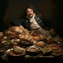 a man sits at a table full of food