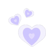 three purple hearts are floating in the air