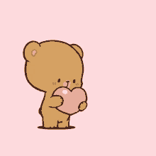 a cartoon teddy bear is holding a pink heart in its mouth