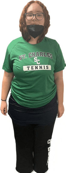 a woman wearing a green shirt that says st. charles sc tennis