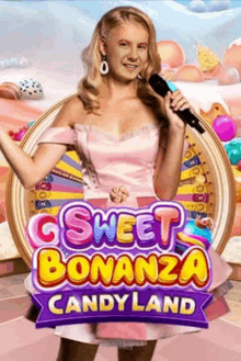 a woman in a pink dress is singing into a microphone in front of a candy land wheel .