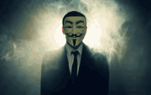 a man in a suit and tie is wearing a mask