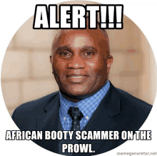 a man in a suit and tie says alert african booty scammer on the prowl