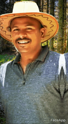 a man wearing a cowboy hat and a gray shirt is smiling