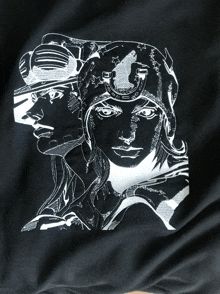 a black shirt with a drawing of a man and a woman