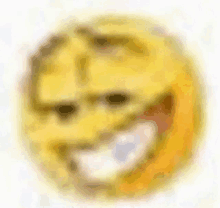 a blurry picture of a yellow smiley face with a smile on it .