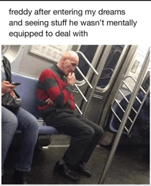 a man in a freddy krueger sweater is sitting on a subway