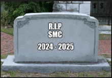 a gravestone that says r.i.p smc 2024-2025 on it