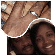 a close up of a man 's hand with a wedding ring on