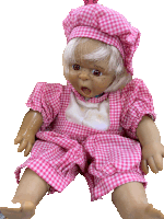 a doll wearing a pink and white plaid outfit