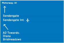 a blue sign that says motorway a1 sendingate sendingate int. a2 towards diana and bridmeadows