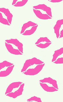 a pattern of pink lips on a white surface