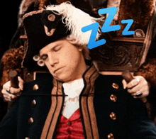 a man in a pirate outfit is sleeping on a chair with a blue zzz symbol above him