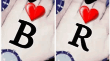 a couple of hands with the letter b and r on them and a red heart .