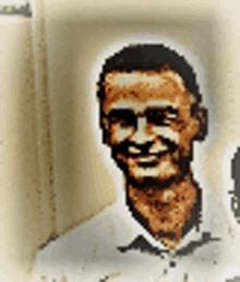 a man with glasses is smiling in a pixelated photo