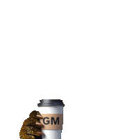 a person holding a cup of coffee with the word gm on it