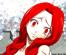 a close up of a girl with red hair making a face