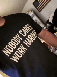 a t-shirt that says nobody cares work harder