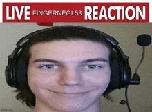 a young man wearing headphones and a microphone is smiling in front of a live fingernegl53 reaction banner