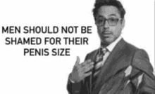 a black and white photo of a man in a suit and tie with a caption that says men should not be shamed for their penis size