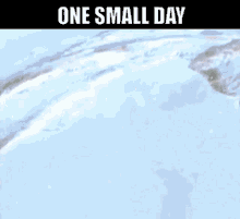 a picture of a snowy mountain with the words one small day above it