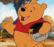 winnie the pooh holding a pot of honey in his hand