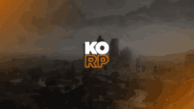 a black and white image of a city with the words ko rp in orange letters .