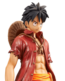 a figurine of monkey d luffy from one piece with a wicker basket on his back