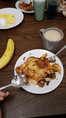 a plate of french toast with a spoon on it