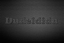 a black background with holes and the word dudeldido