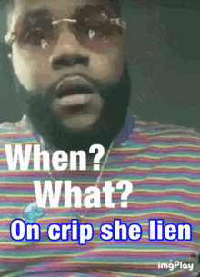 a man with a beard wearing sunglasses and a rainbow shirt says " when ? what ? on crip she lien "