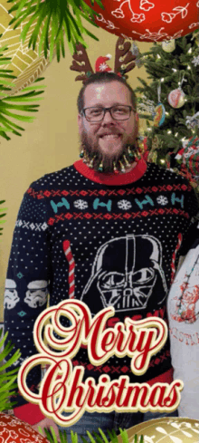 a man wearing a darth vader christmas sweater