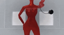 a red cartoon character is holding a black object in her hand